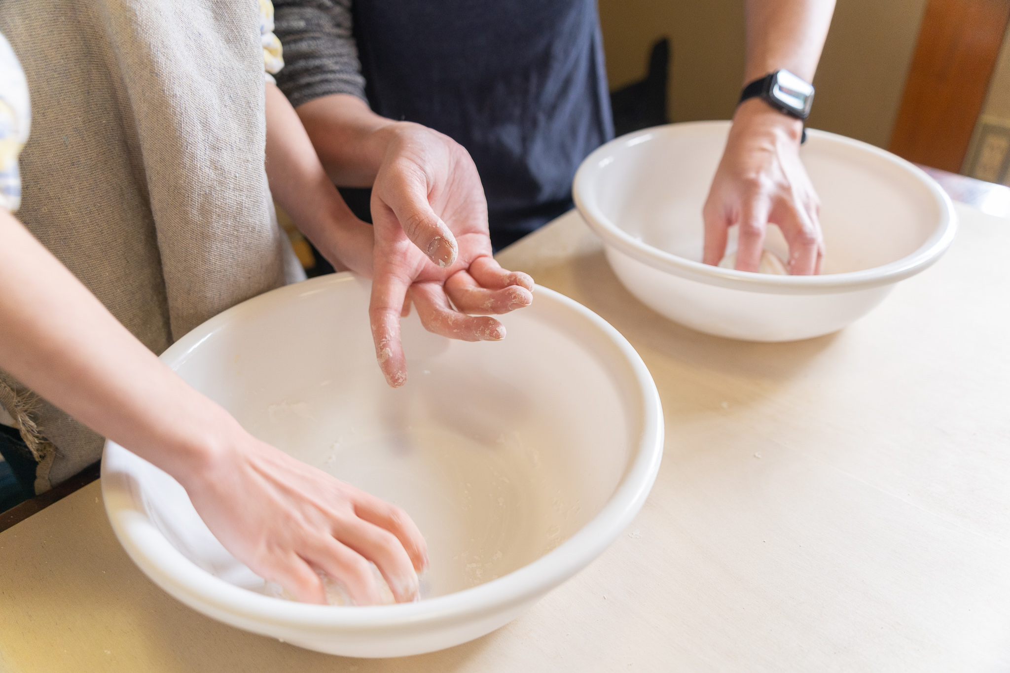 Mixing hōtō flour and water by hand