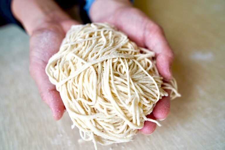 Hand-made ramen noodles freshly cut and ready to cook