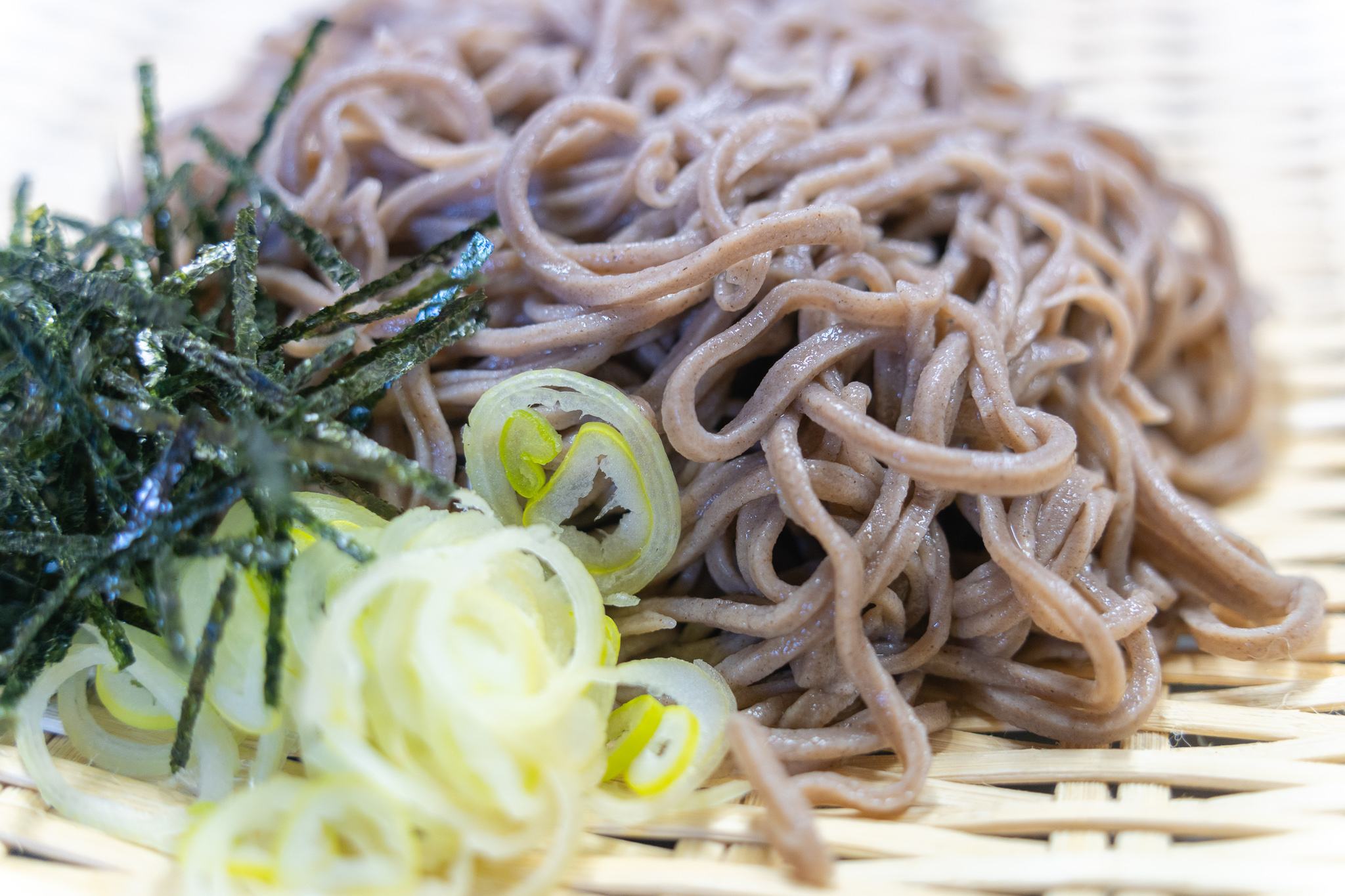 Zaru soba on bamboo tray — the finished bowl